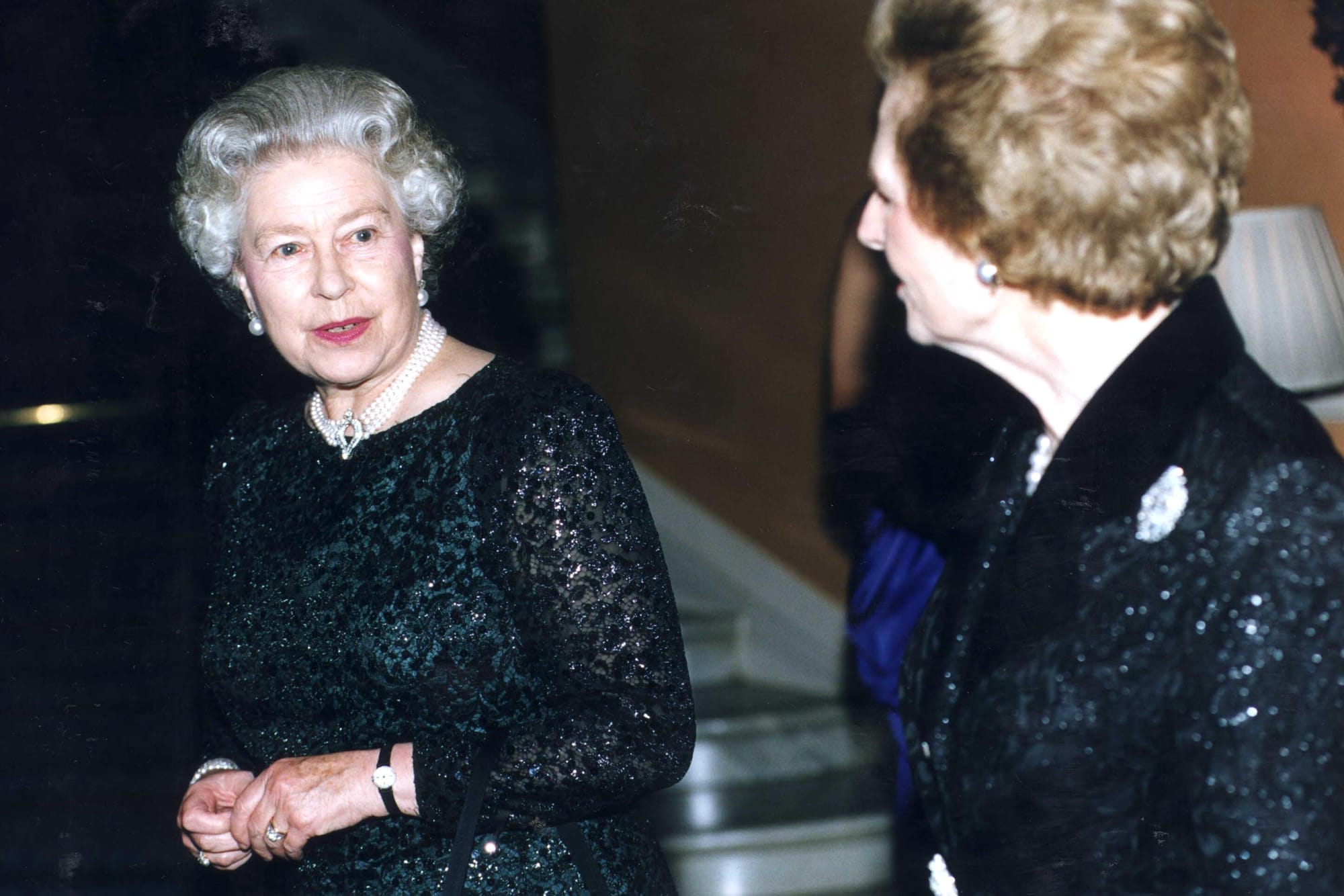 The Queen and Baroness Thatcher at the latter's 70th birthday party in 1995.