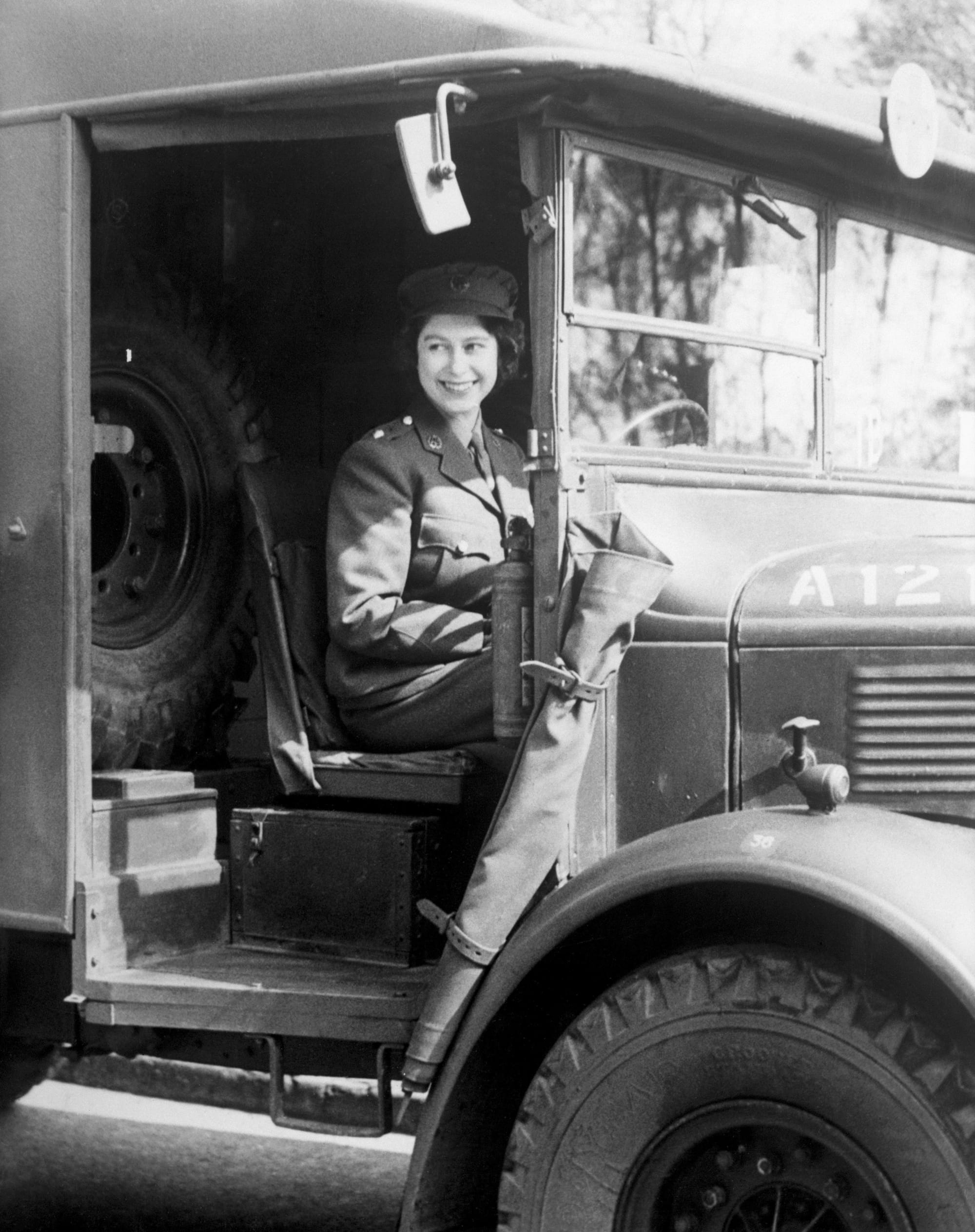 In a photo from 1945, Princess Elizabeth (later Queen Elizabeth II) takes the wheel of an Army vehicle when she served during the Second World War in the Auxiliary Territorial Service.